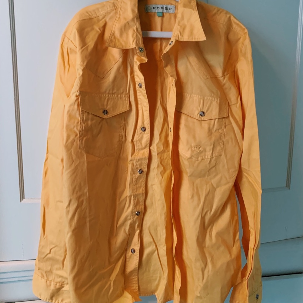 yellow collared shirt